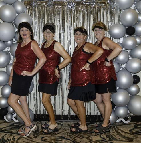 Brenda-Creel-Ann-Martin-Lori-Stegink-and-Lana-Onsted-show-off-their-Bling-at-the-MPWGA-Member-Guest.jpg