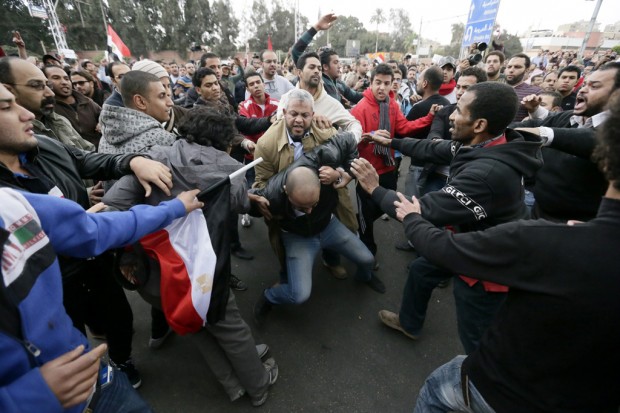 Egypt in the grasp of upheaval as Morsi allies, foes fight it out    