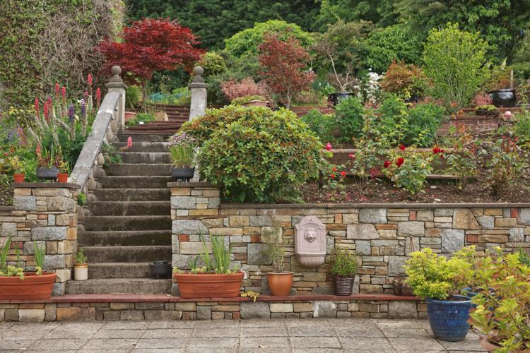 Natural stone steps and retaining wall with terraces