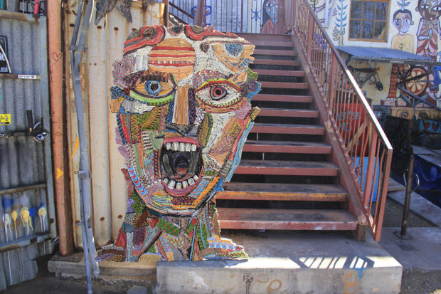 Drab walls hide lively cooperative for artists    