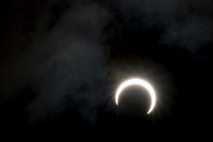 Annular Eclipse Partial Dark Clouds