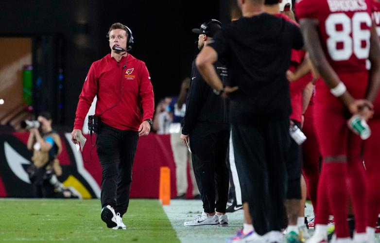 Cardinals head coach Mike LaFleur walks the sidelines during a preseason game against the Cowboys at State Farm Stadium in Glendale, Ariz. on August 22, 2026.