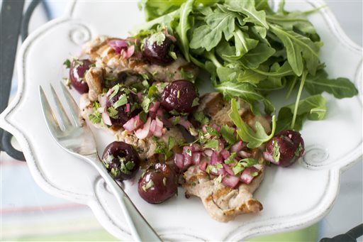 Pork with a fresh take on salsa _ grilled cherries