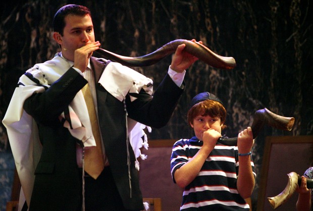 Final letters are added at Emanu-El ceremony   