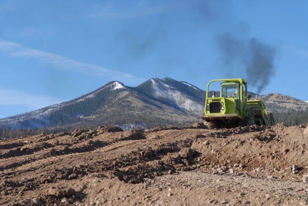 Pumice pit being reclaimed after stone-wash fad fades   