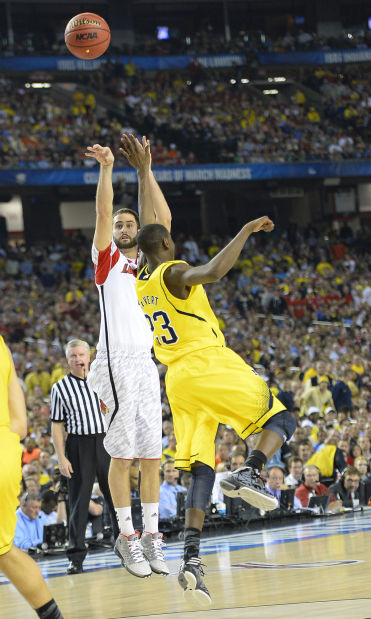 NCAA CHAMPIONSHIP: LOUISVILLE 82, MICHIGAN 76: Louisville gives Pitino 2nd thrill