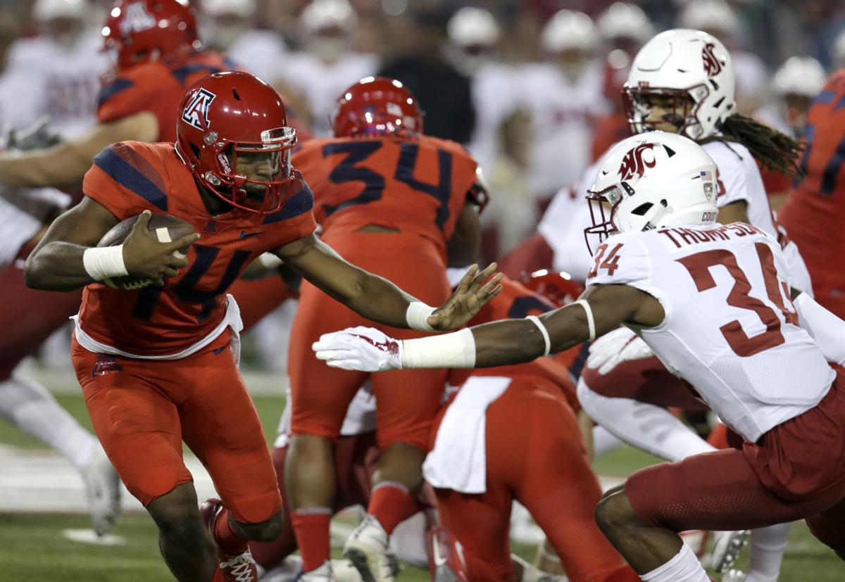 Bowled Over Khalil Tate J J Taylor Run Wildcats Past 15th
