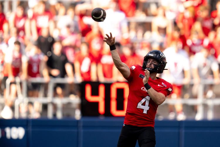 Cincinnati Bearcats quarterback JC French IV (4) throws a pass in the second quarter of the football game between Cincinnati