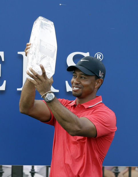 Golf: Tiger wins Players as Garcia falls apart