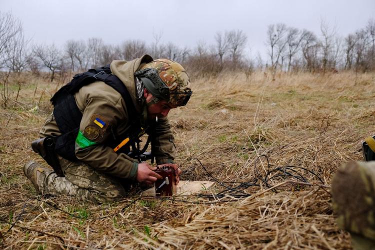 Russian forces left bombs, death and destruction around Kyiv. Now, a painstaking demining operation is underway
