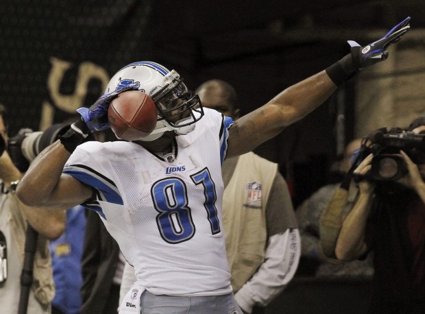NFL Notebook: Lions' Johnson signs for $132M    