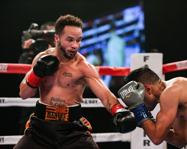 Patricio Manuel, left, posted a unanimous decision victory over Hugo Aguilar in the 128-pound super featherweight division bout Saturday night, Dec. 8, 2018, at Fantasy Springs Casino in Indio, California. Manuel became the first transgender male to compete as a pro boxer in the United States.