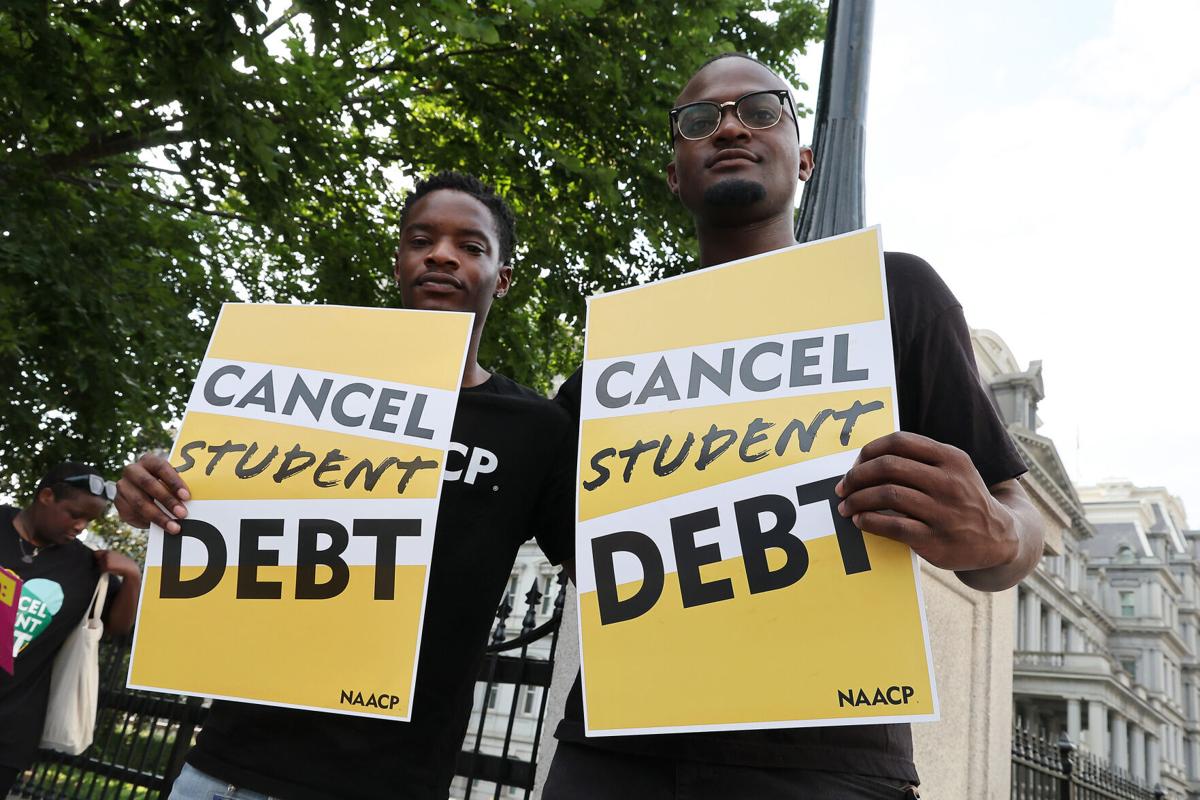 Student loan borrowers stage a rally in front of the White House to celebrate President Joe Biden cancelling student debt and to begin the fight to cancel any remaining debt on Aug. 25, 2022, in Washington, D.C.).