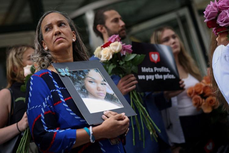 FILE PHOTO: Activists and victims families demonstrate outside New York City headquarters of Meta to to demand more safeguards for children on social media platforms