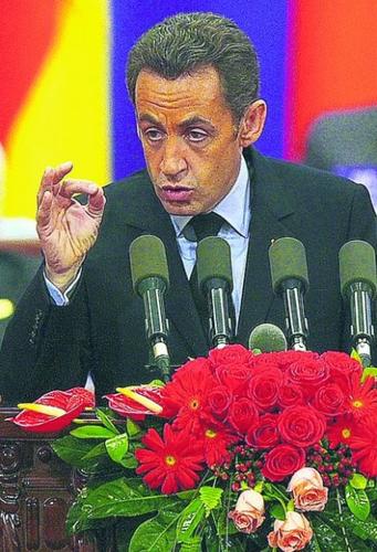 French president sues to block voodoo doll, control his image  