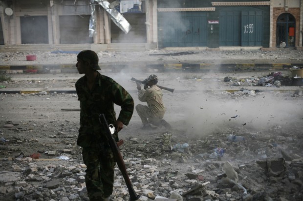 Tripoli sees 1st big battle since Gadhafi fled in Aug.   