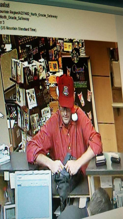 Robber wears a Santa hat