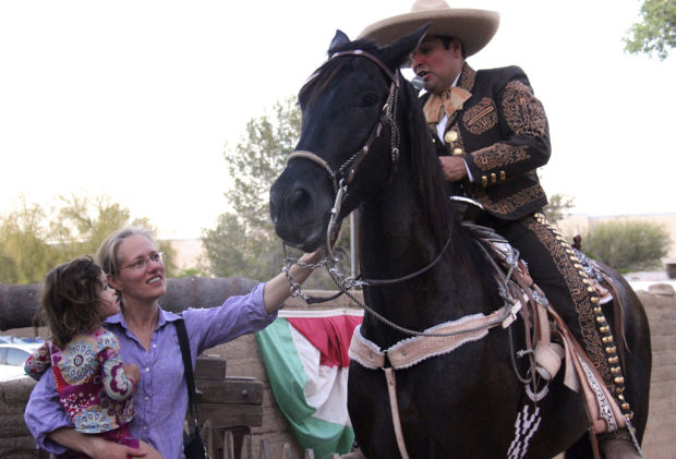 Charros, horses in tune    