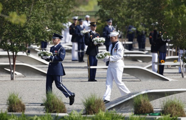 At attack sites, many seek solace, new hope   