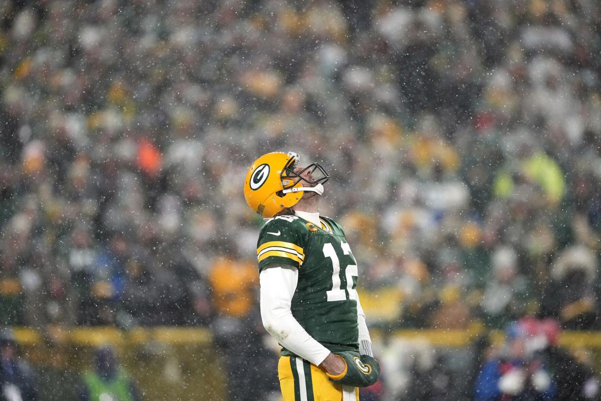 Green Bay Packers quarterback Aaron Rodgers looks skyward during the fourth quarter against the San Francisco 49 ers in an NFC Divisional Playoff game at Lambeau Field on Saturday, Jan. 22, 2022, in Green Bay, Wisconsin.