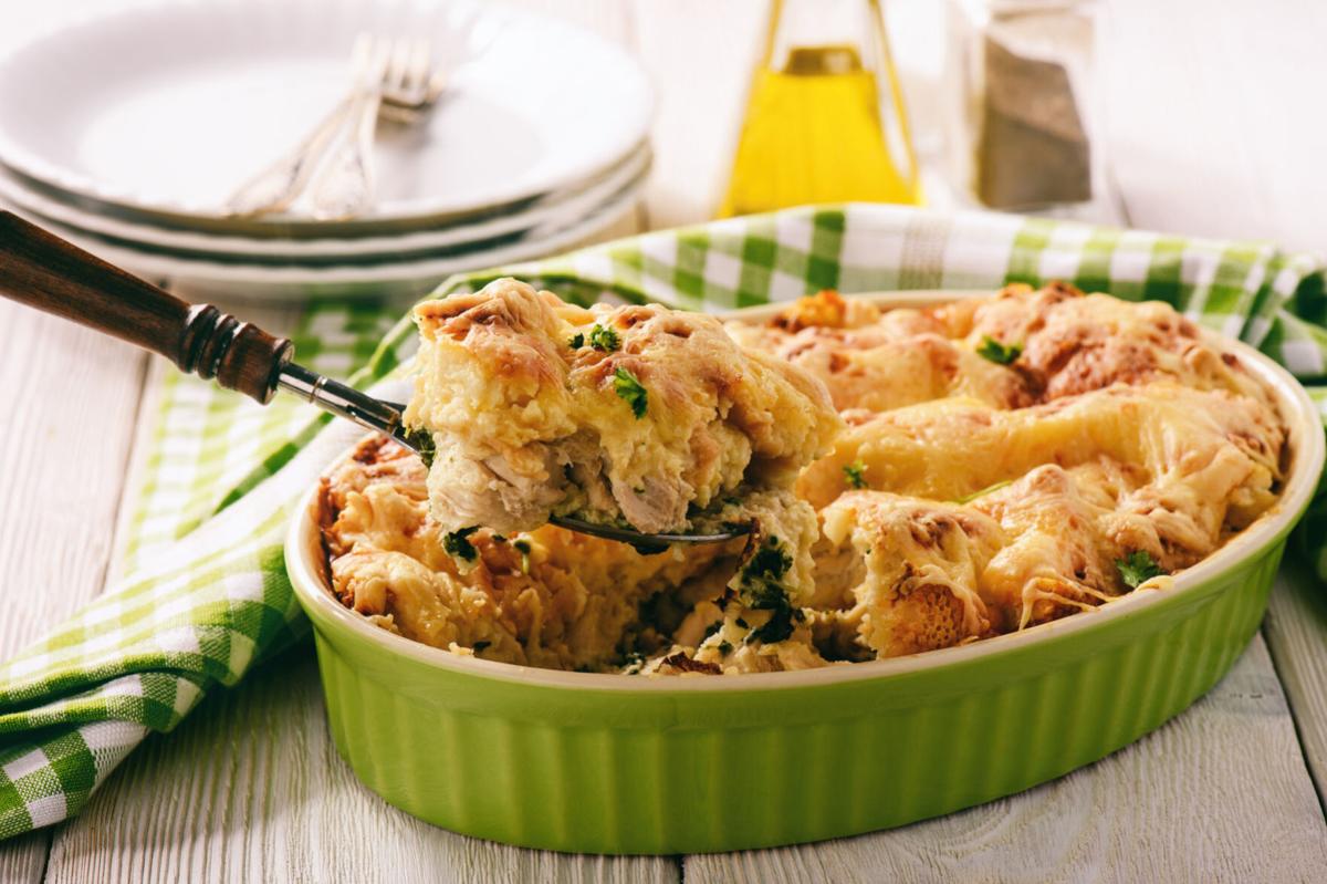 Bread casserole with chicken, spinach,eggs and cheese known as strata.