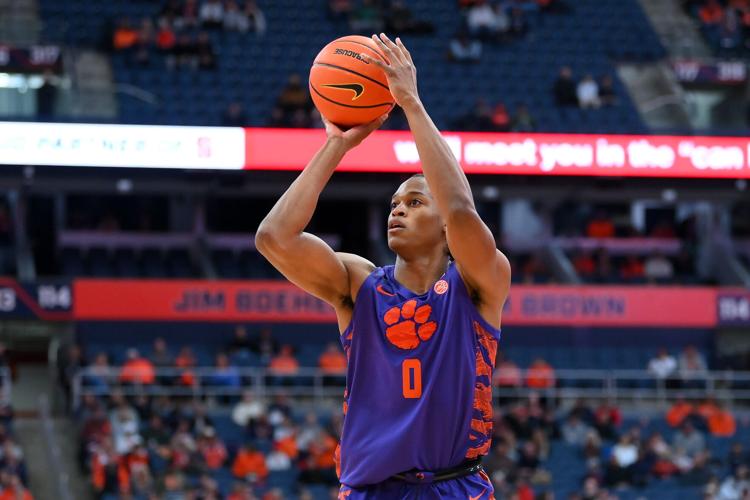 Dec 31, 2025; Syracuse, New York, USA; Clemson Tigers forward RJ Godfrey (0) shoots against the Syracuse Orange during the first half at the JMA Wireless Dome. Mandatory Credit: Rich Barnes-Imagn Images