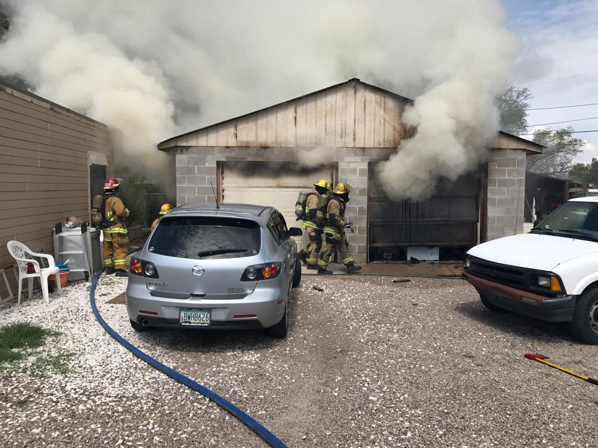 Firefighters battle garage blaze on Tucson's north side
