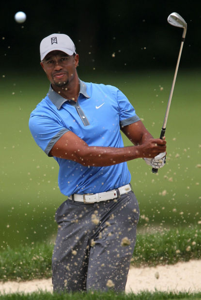 Golf: Tiger ties career best with 61    