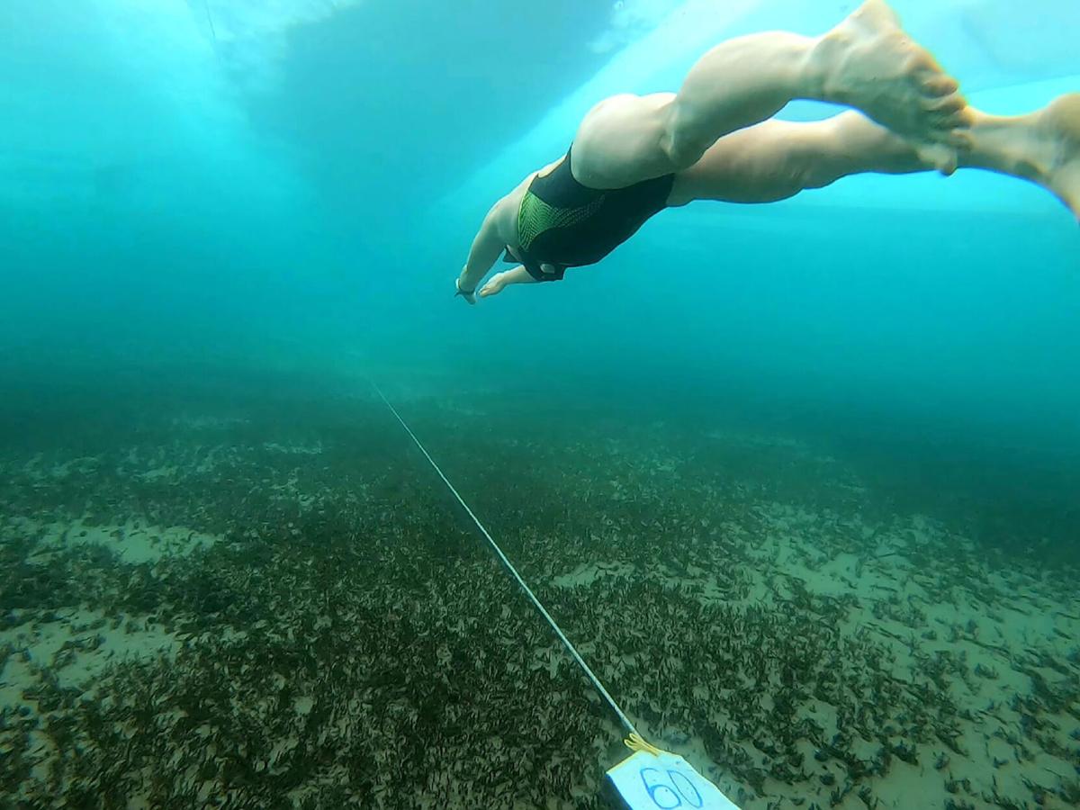 Russian woman who swam under Siberia's ice may have broken the world record, image size:1200x900