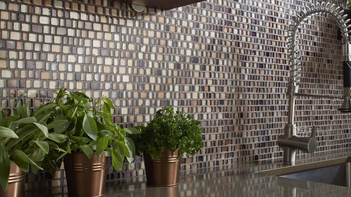 First install the kitchen counters, then put up the tile backsplash
