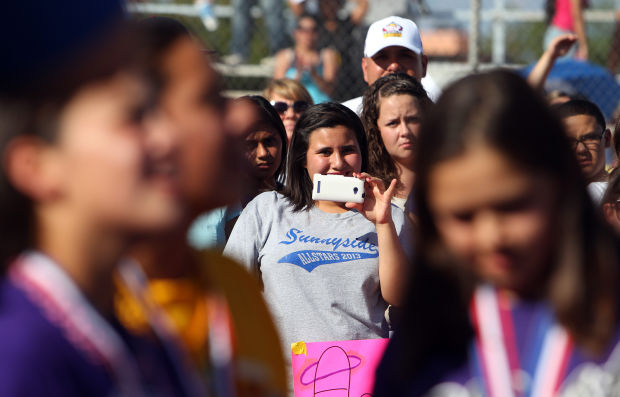 Sunnyside Little League softball team arrives home