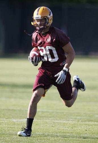 Patrick Finley: Holliday picks real world over gridiron    