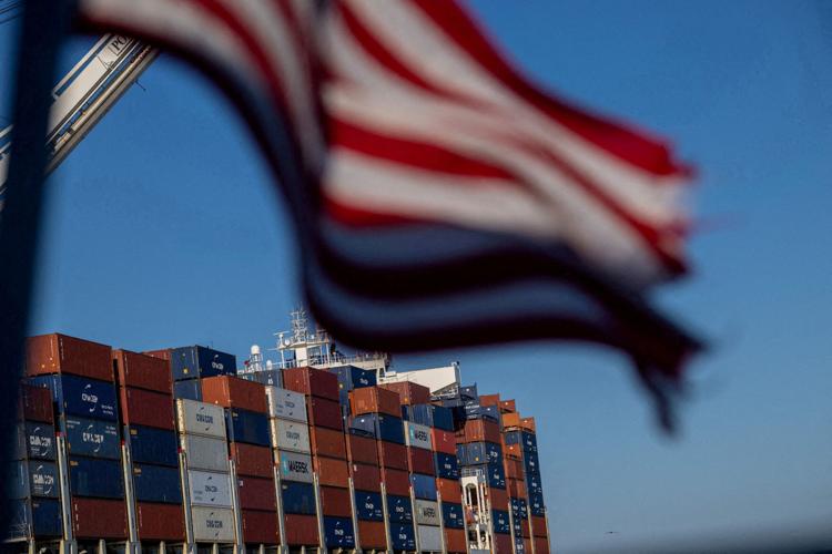 FILE PHOTO: A cargo ship full of shipping containers is seen at the port of Oakland, California