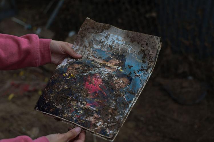 After deadly floods, Globe focuses on repair