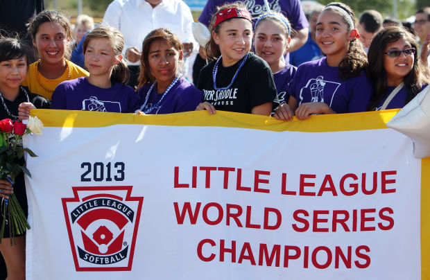 Sunnyside Little League softball team arrives home