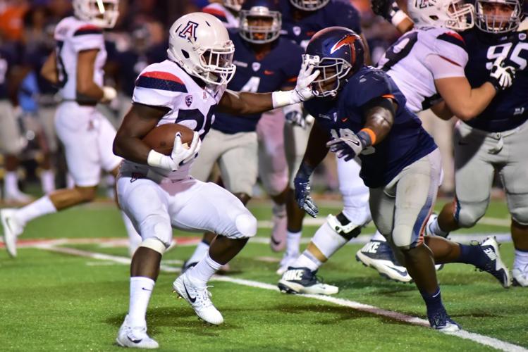 Nick Wilson Stiff Arm.JPG