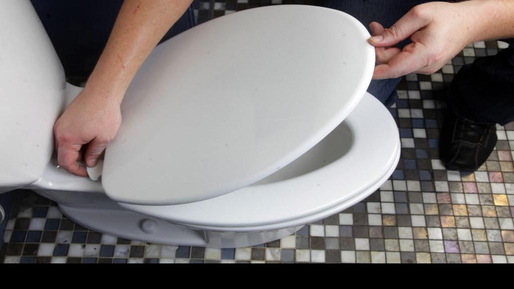 Pink ring in toilet bowl