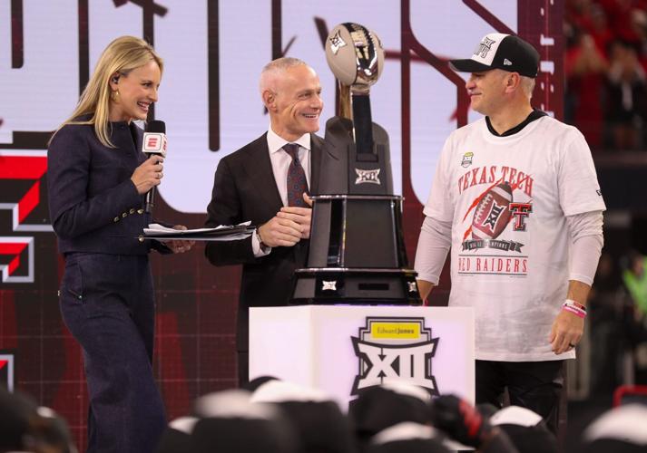 Texas Tech head coach Joey McGuire stands with commissioner Brett Yormark (middle) and ESPN's Katie Georgie after winning Big 12 Championship football game, Saturday, Nov. 6, 2025, at AT&T Stadium in Arlington.