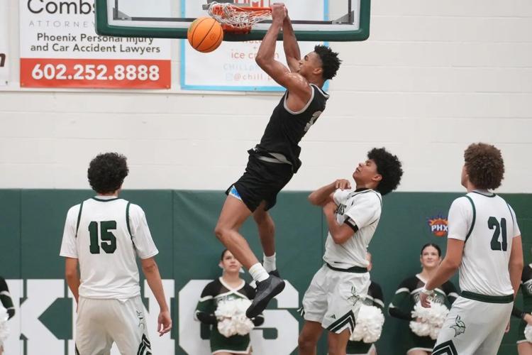 Millennium guard Cameron Holmes