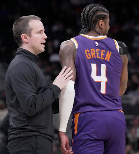 Phoenix Suns head coach Jordan Ott talks with guard Jalen Green (4) during the second half of their game Tuesday, March 10, 2026 at Fiserv Forum in Milwaukee, Wisconsin. The Phoenix Suns beat the Milwaukee Bucks 129-114.