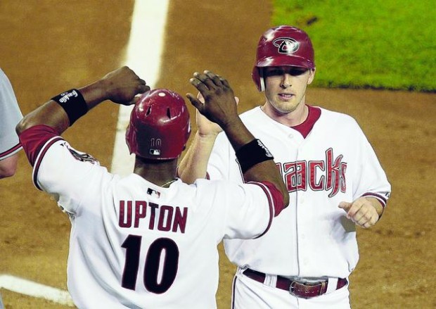 Braves' error, Haren's control prove potent mix for D-backs  