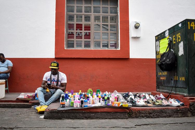 Migrants stuck in southern Mexico still rely on money from family to live