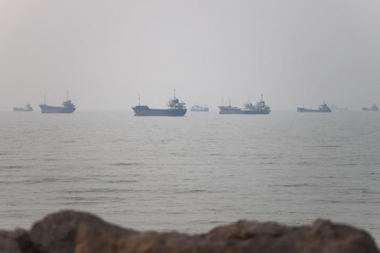 FILE PHOTO: Vessels in the Strait of Hormuz near the beach of Bandar Abbas