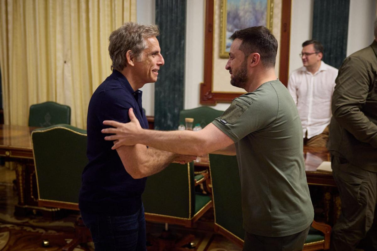 Ukrainian President Volodymyr Zelenskyy, right, meets with Ben Stiller