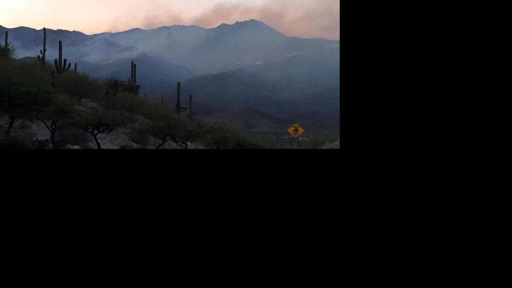Tucson's Bighorn Fire Pocket fires boosting smoke over the city