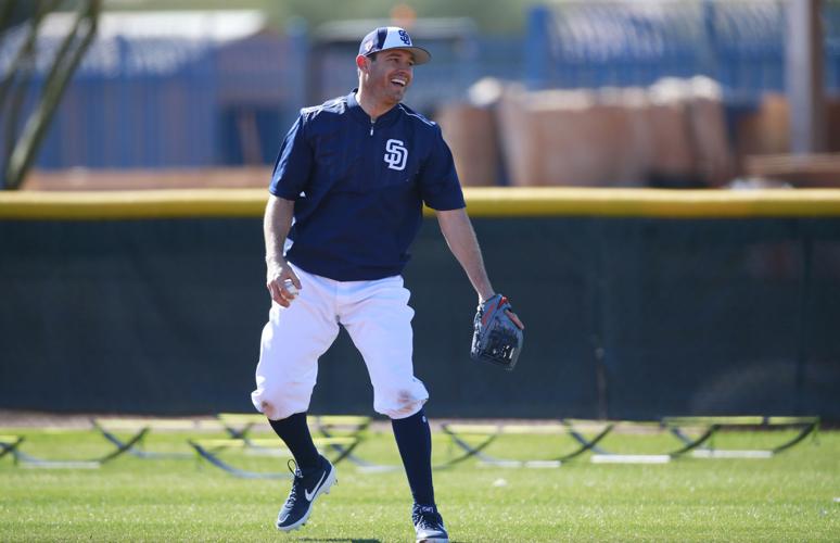 San Diego Padres infielder Ian Kinsler fields a ball during a spring training practice on Feb. 19, 2019.
