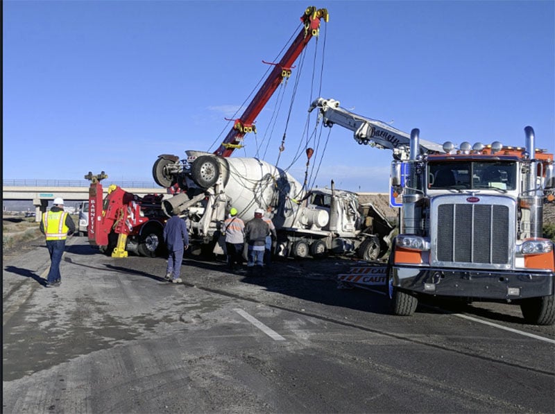 Fully loaded concrete truck overturns, spilling concrete on I-10 near Chandler