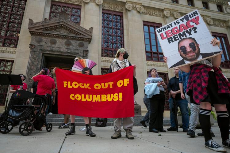 Anti-Flock surveillance protesters gather outside Columbus City Hall before Councilmember Emmanuel Remy holds a council hearing