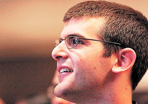 Joe Kay rides his bike at Stanford, looking for 'normal'  