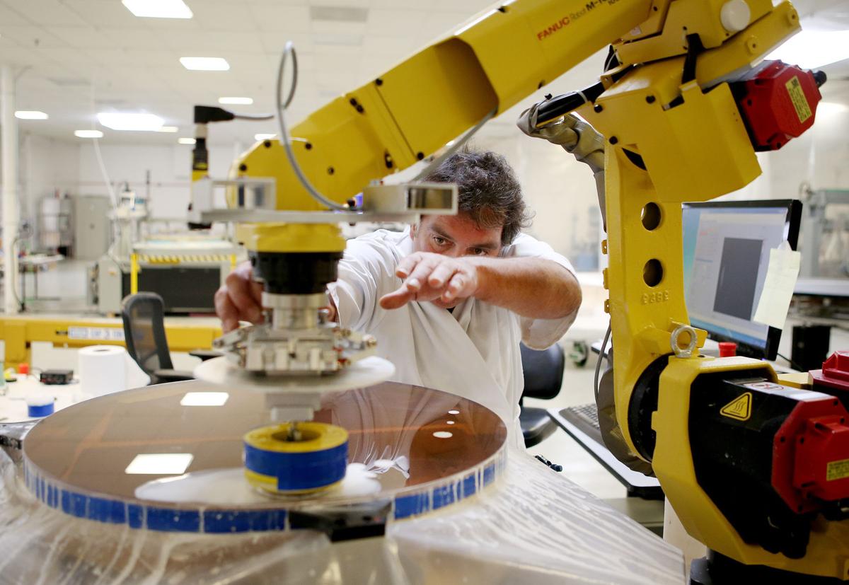 Tucson optics cluster looks for more clout after merger Tucson